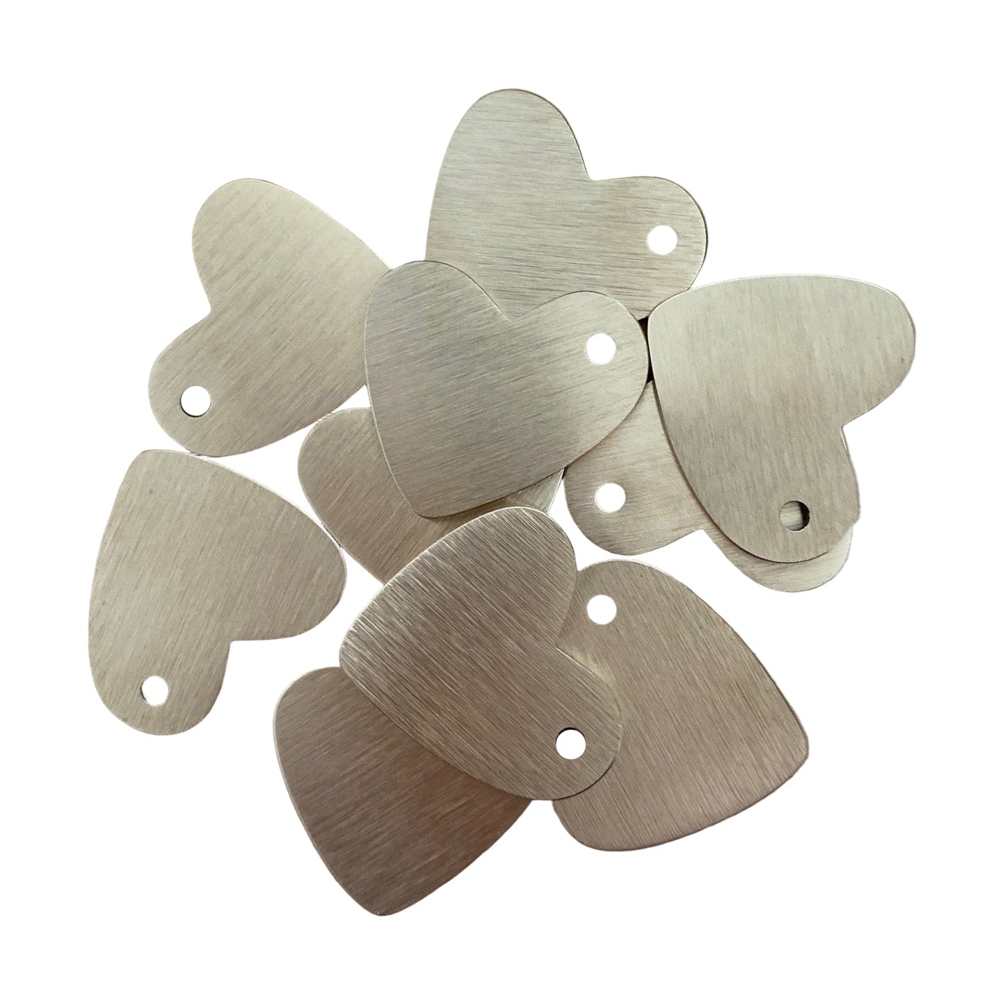 Metallic heart-shaped tags on a white background