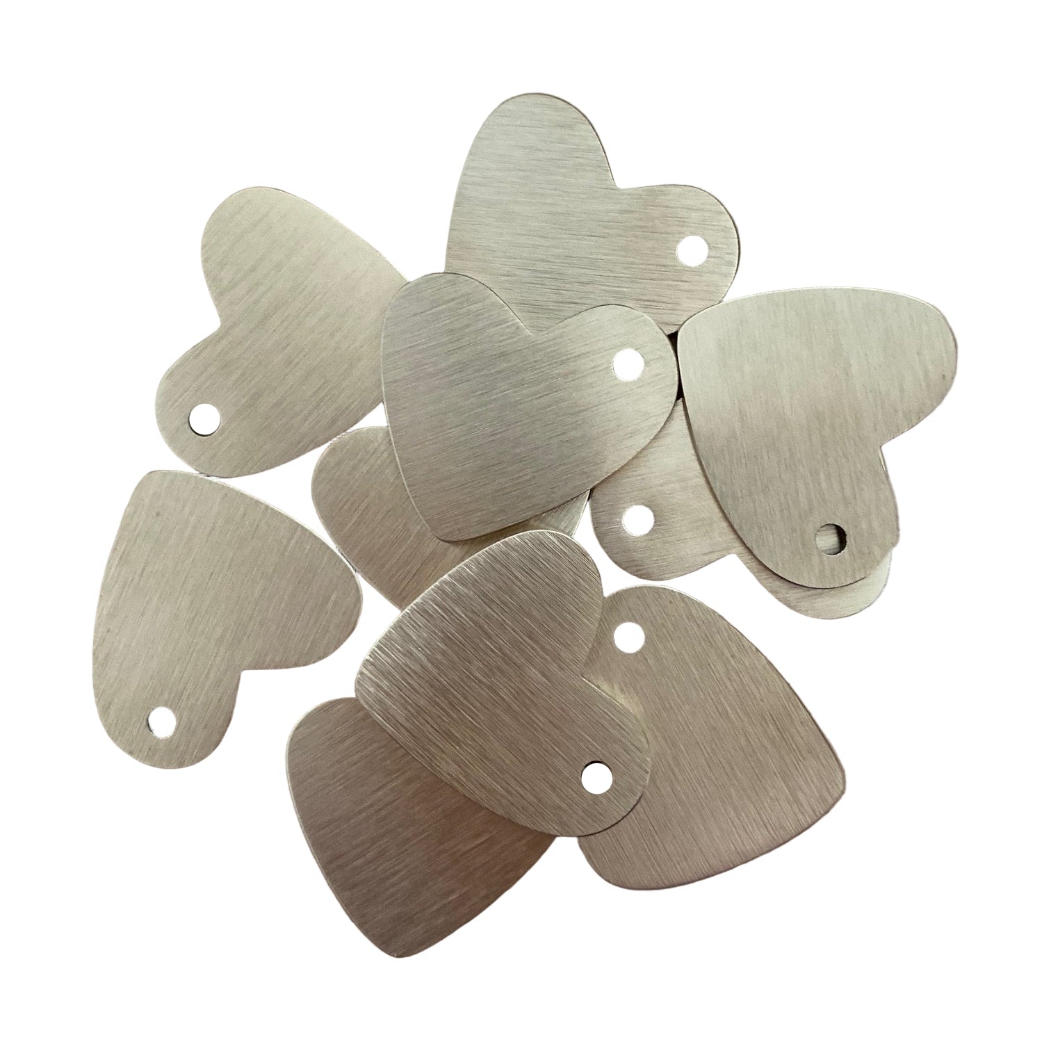 Metallic heart-shaped tags on a white background